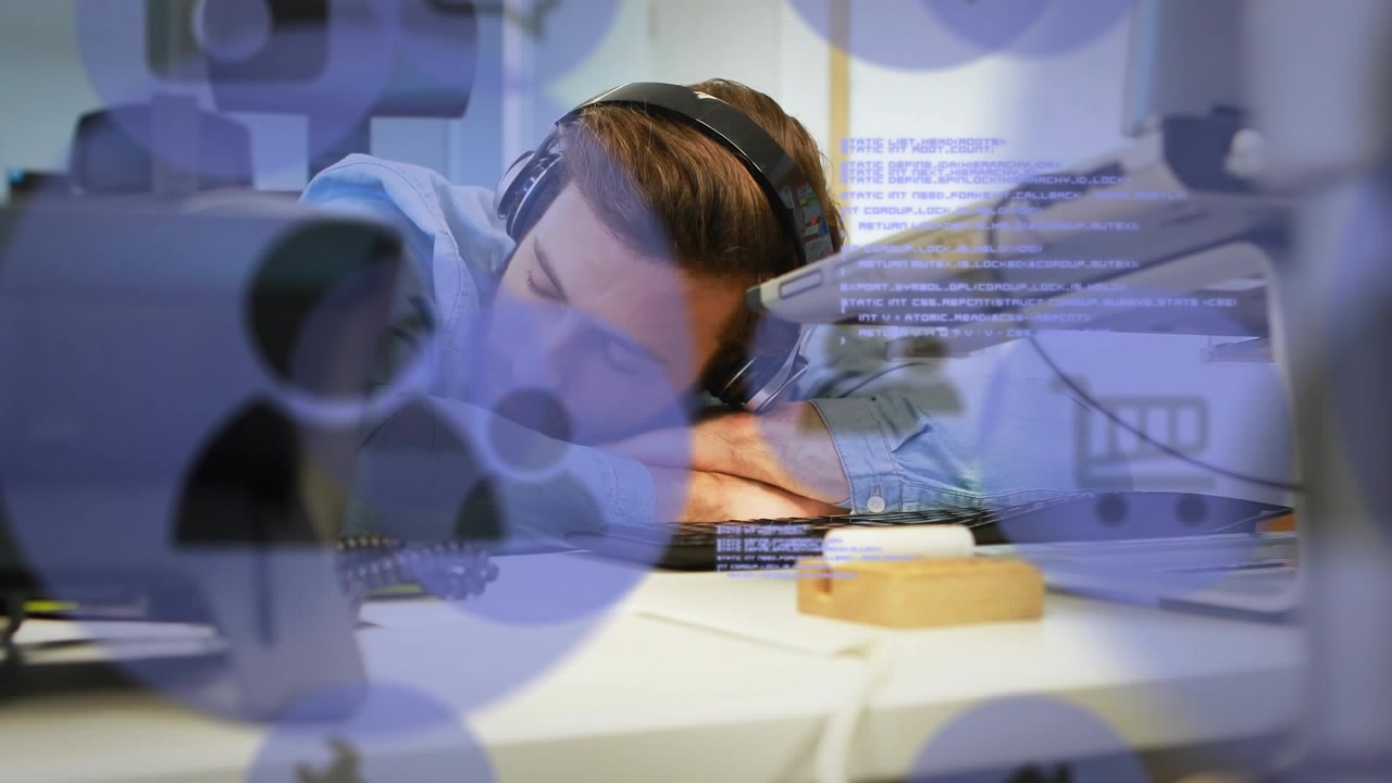 Animation of digital icons and data processing over caucasian man sleeping on his desk at office