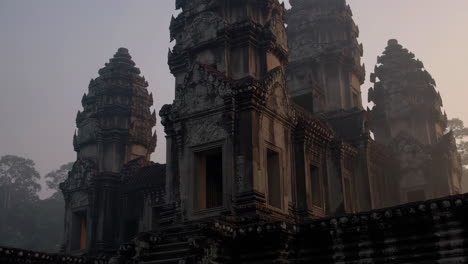 ancient temples of angkor wat in the mist