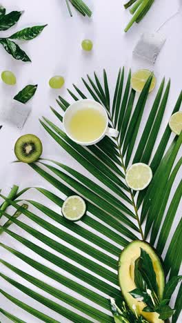green tea and tropical fruit flat lay