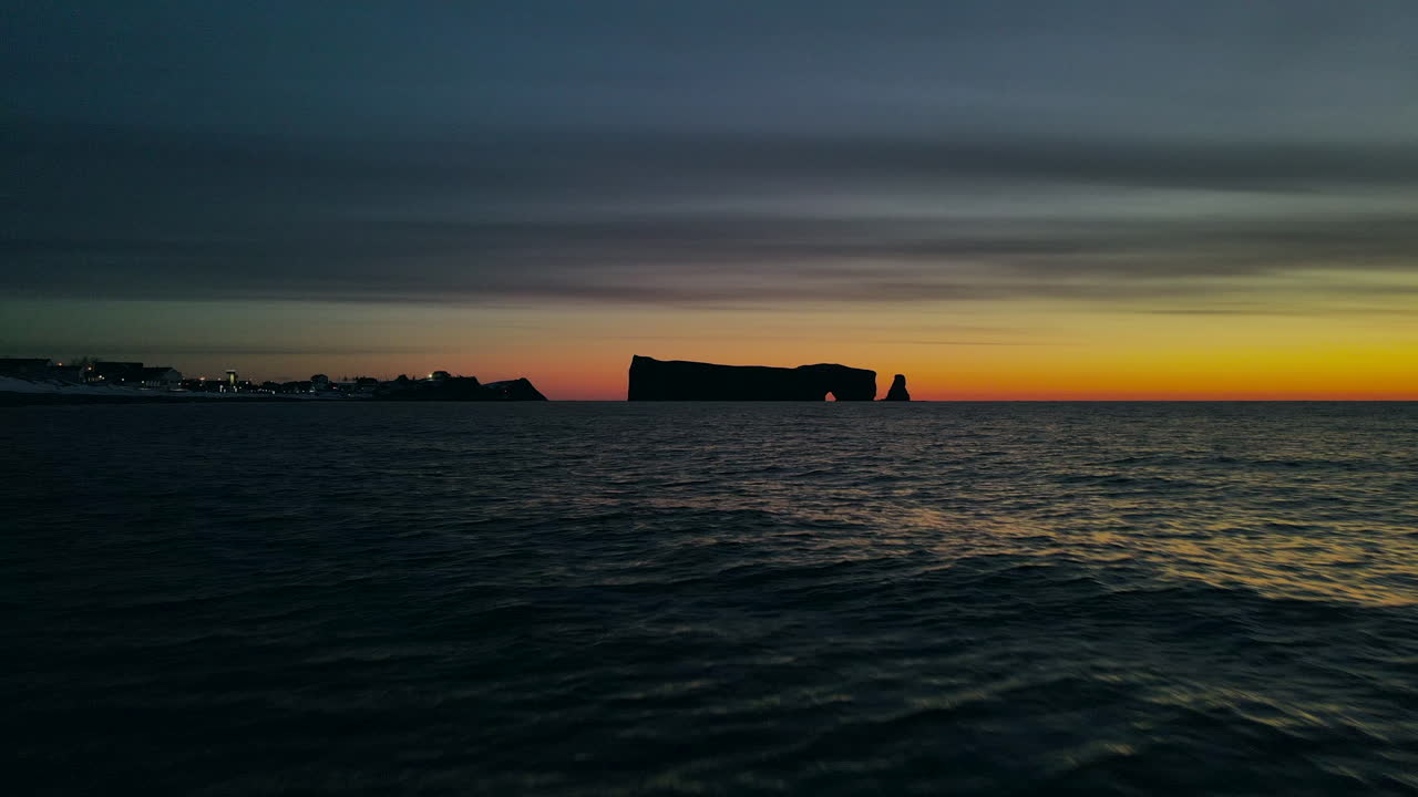 Drone view at sunrise of famous perce rock in Percé, Québec, Canada