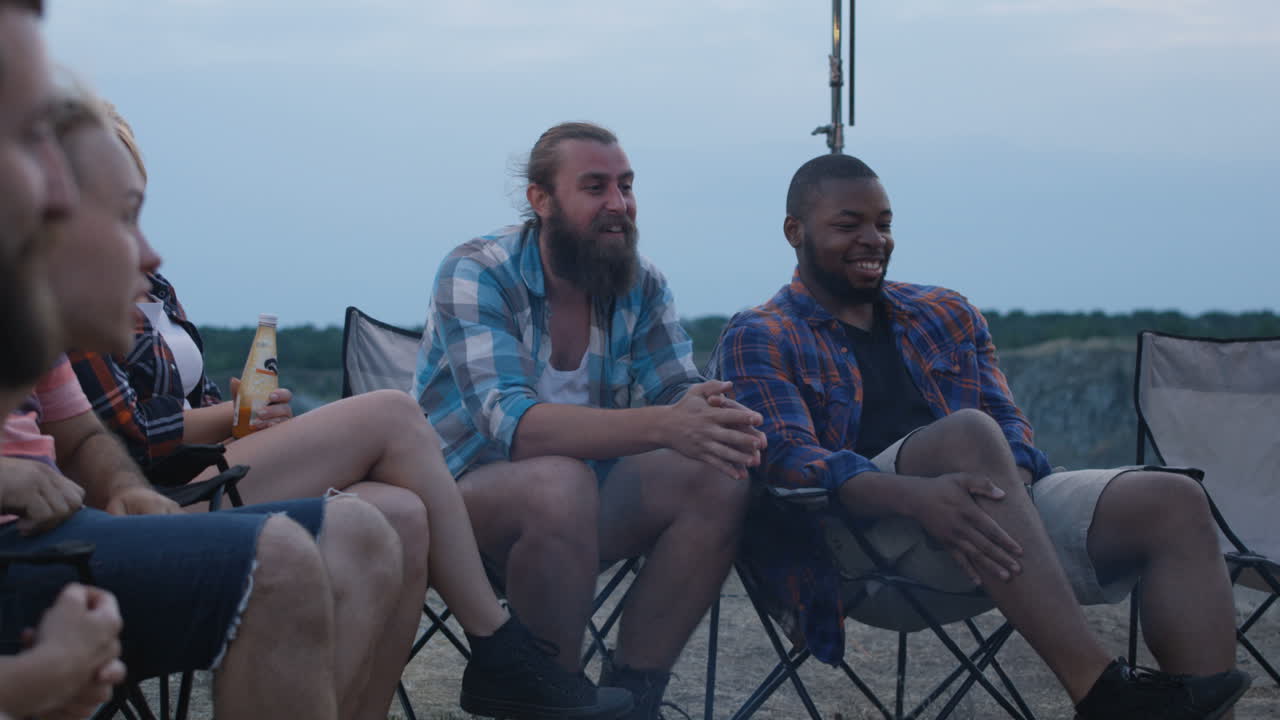 Friends Camping at Dusk