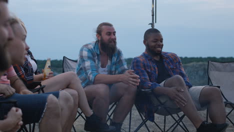 friends camping at dusk