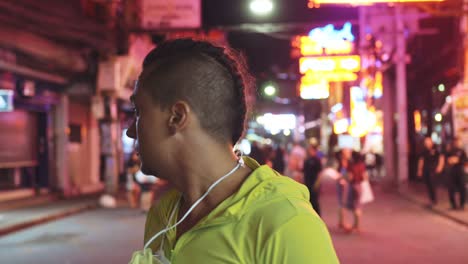 man close up look caucasian at pattaya walking street with wearing protective medical mask. lockdown quarantine isolation. coronavirus covid-19.