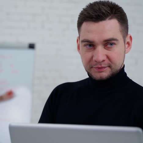 man working with woman