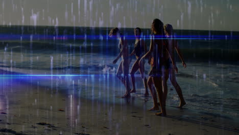 people walking on beach with digital data animation overlaying scene