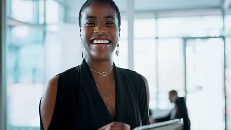 happy businesswoman using tablet in modern office