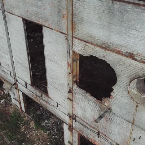 aerial view of a destroyed factory during the war. abandoned industrial building.