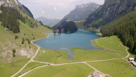 A-drone-flying-above-a-mountain-lake-in-switzerland