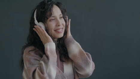 woman enjoying music with headphones