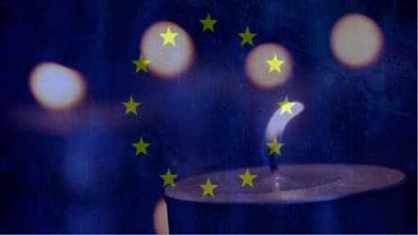 european flag with candle going out