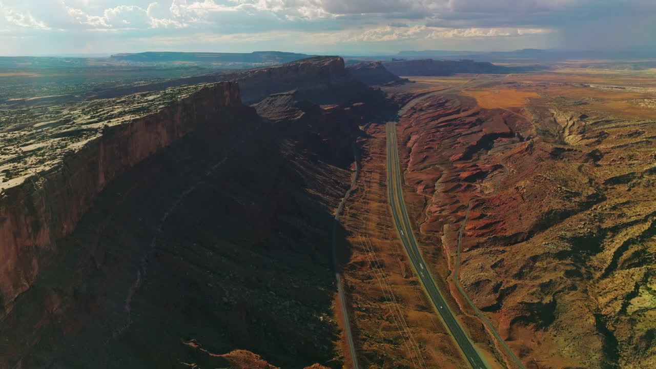 Gorgeous scenery of mountainous landscape in Zion National Park, Utah, USA. Motorways crossing the desert. Cloudy sky at backdrop.