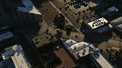 cars driving over an intersection into different directions in the city center of dener