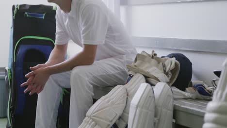 cricket players preparing in the locker room