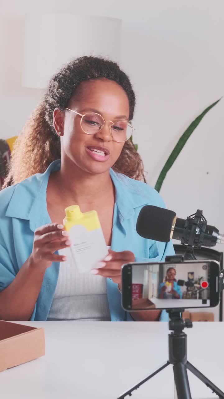 Unboxing a special delivery while sharing thoughts in a cozy studio