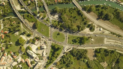 urban area, cars driving, green nature and roads