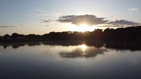 lagoon sunset drone shot in portugal