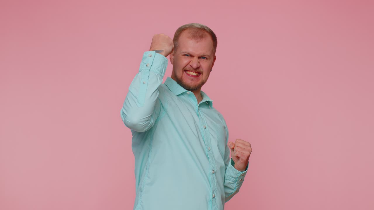 Countdown to holiday birthday celebration happy man counting in reverse order from five to one win