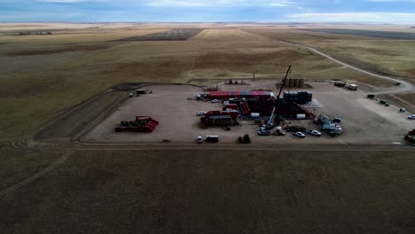 wide angle dramatic lighting of a fracking oil extraction pad 2021 in eastern colorado