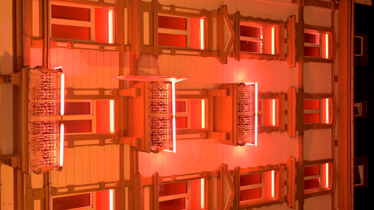 View of a lighted building at night in Frankfurt, Germany
