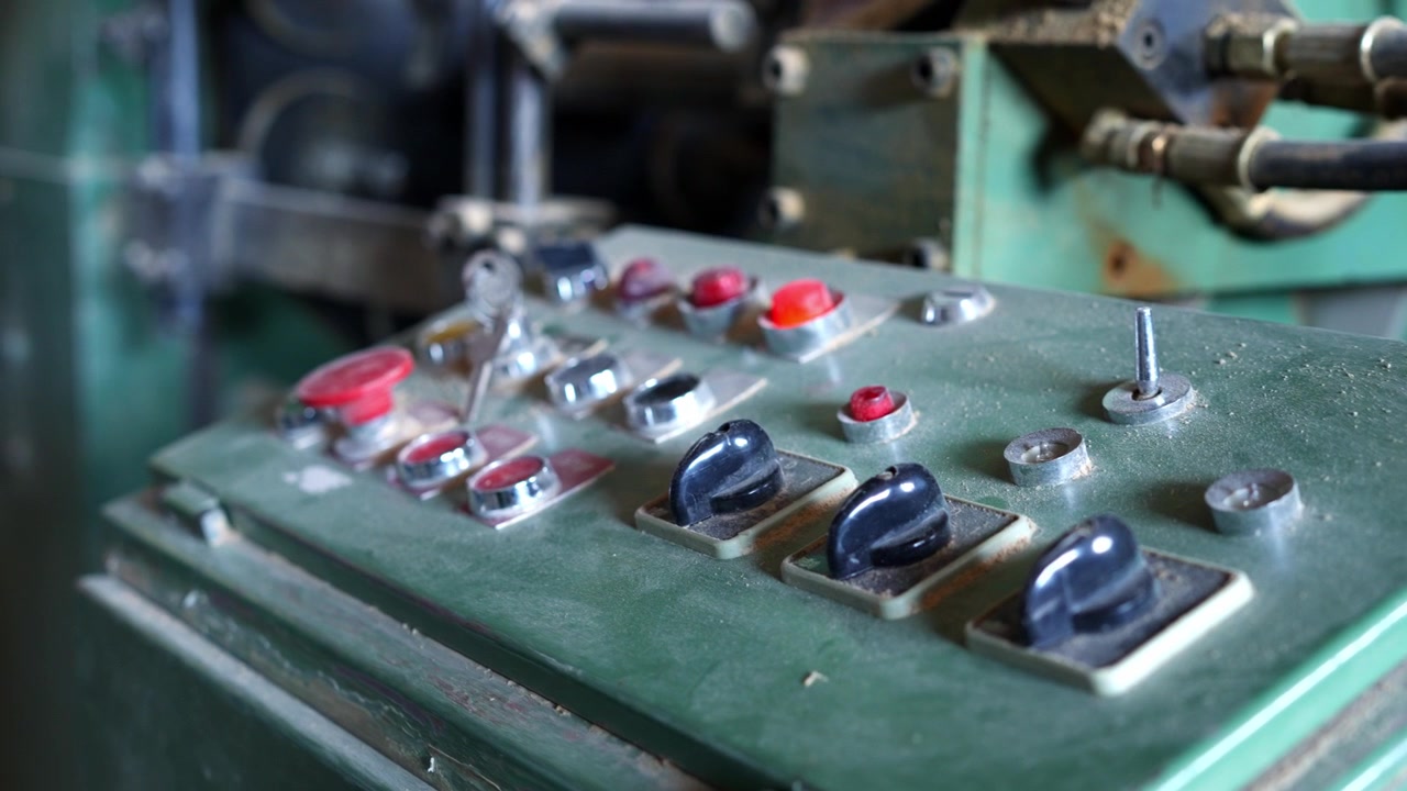 Dusty old industrial machinery control panel