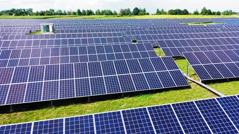 aerial view top view on blue solar pannels. alternative energy. green energy concept. electricity production