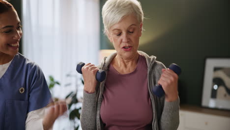Senior Woman Exercising with Home Care Nurse