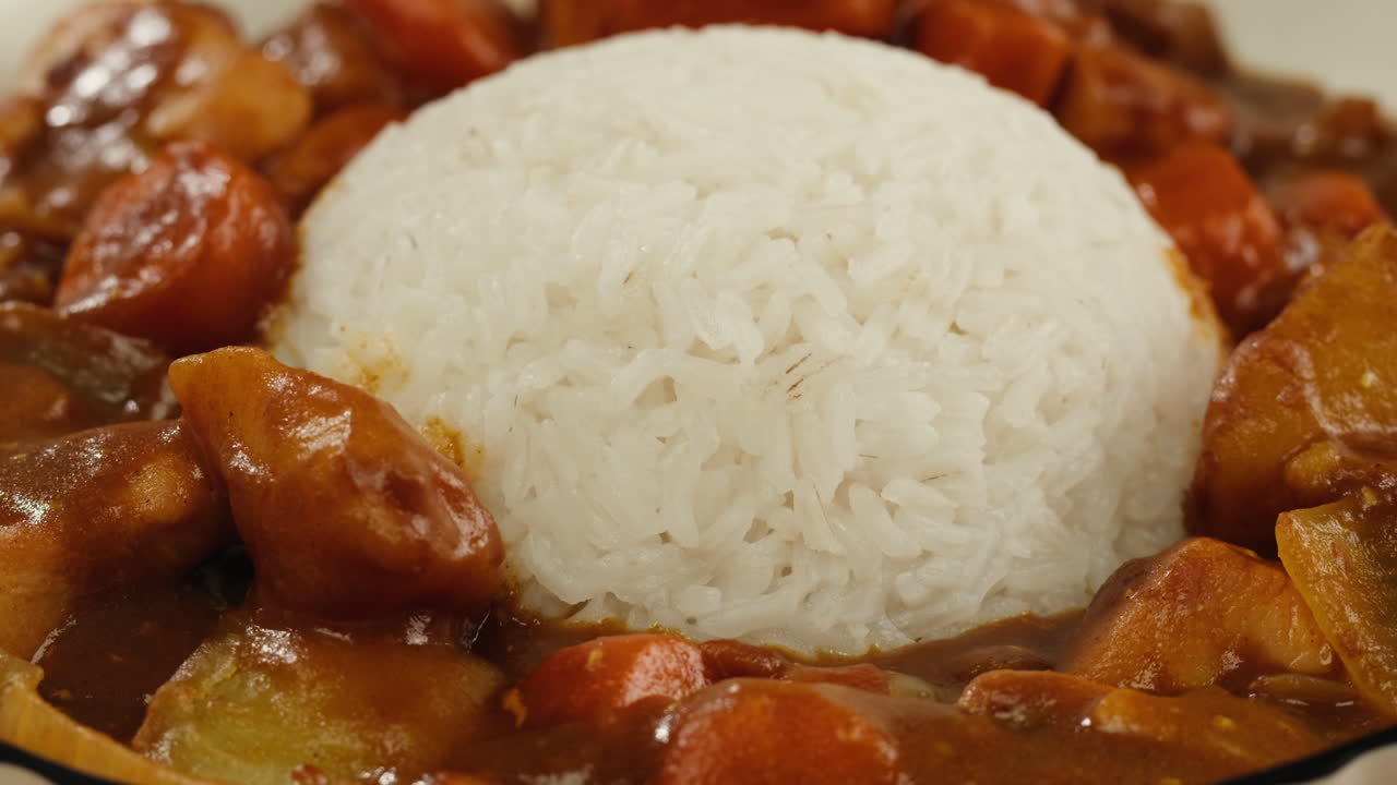 Japanese curry rice with fry pork Tonkatsu, Katsu Kare, Japanese breaded cooking dinner in restaurant, close up macro of asian food