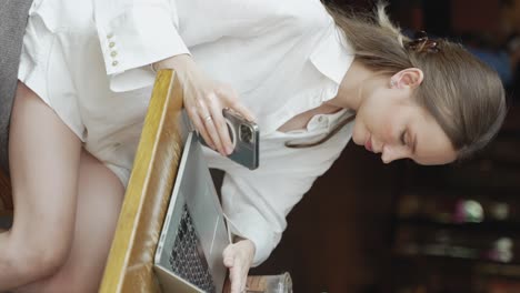 young woman working in a cafe