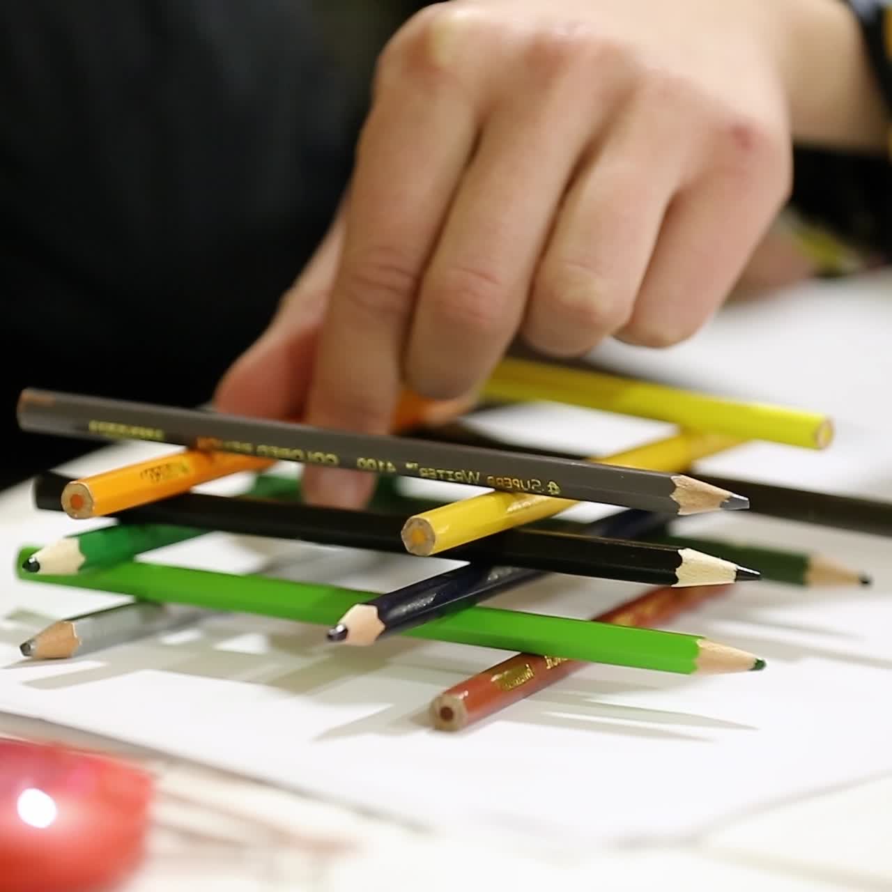 Child With Pencil In Play
