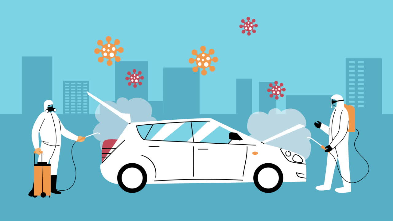 생물 안전복과 소독제 스프레이를 착용한 노동자