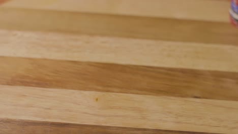 static close up of a man pushing stack of poker chips