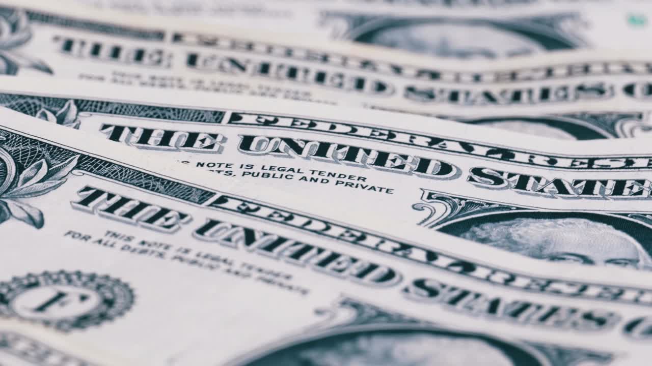 dólares, los billetes estadounidenses de valor de un dólar se rotan