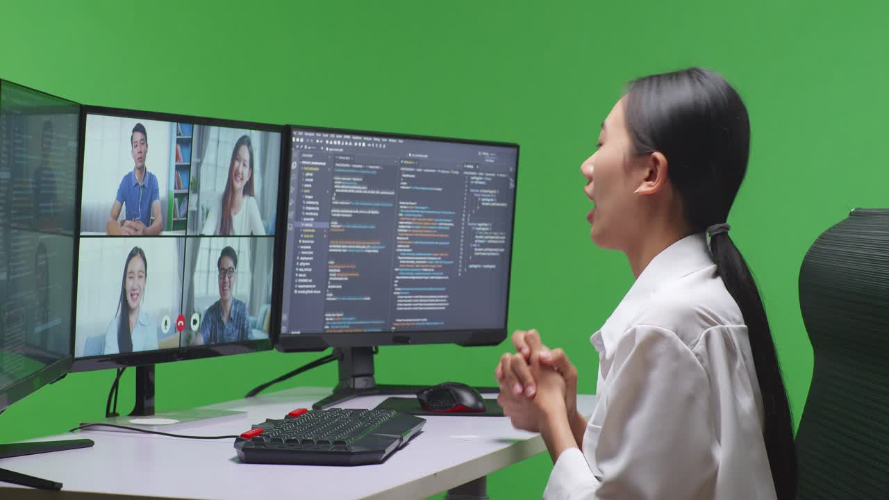 Woman in a Video Conference and Coding Session