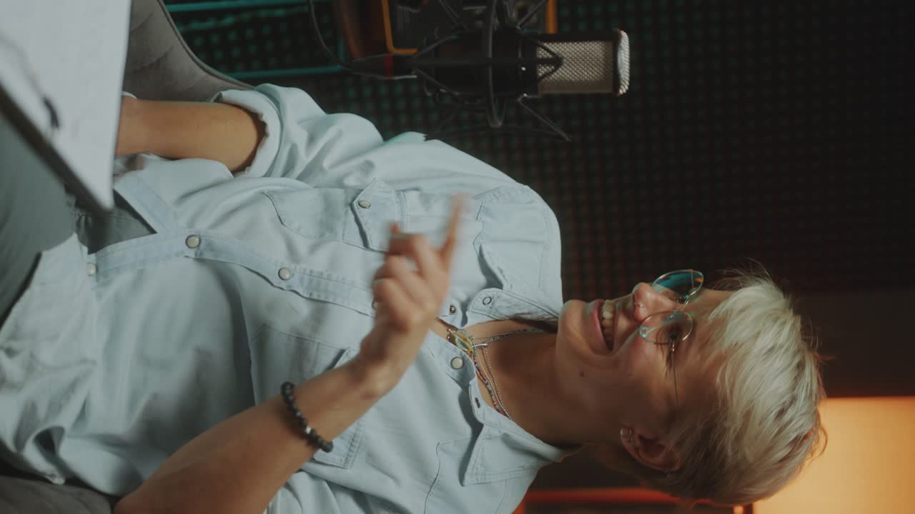 Female Podcast Host Speaking in Mic and Recording Interview at Studio