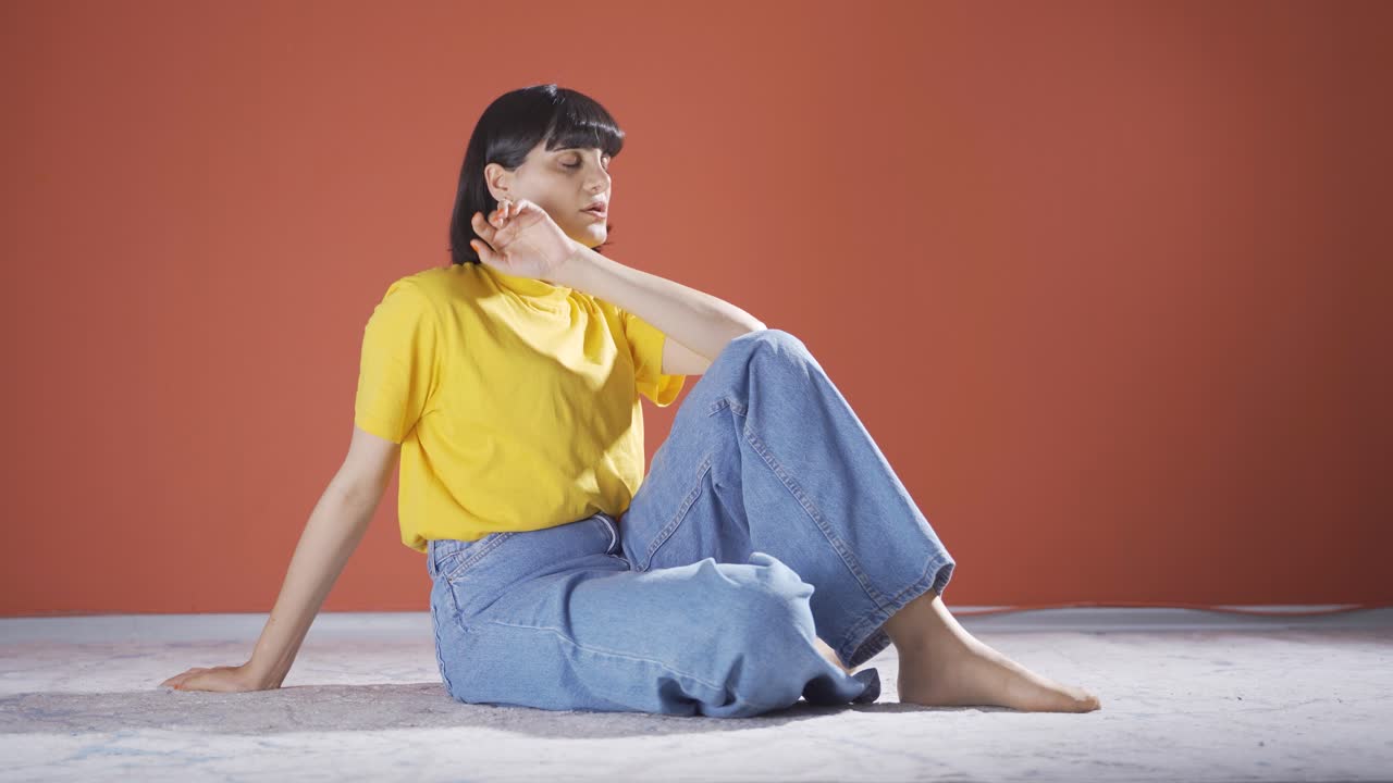 The woman who doesn't feel well.