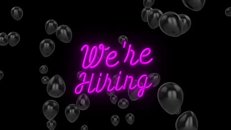 we''re hiring text animation over floating black balloons on dark background