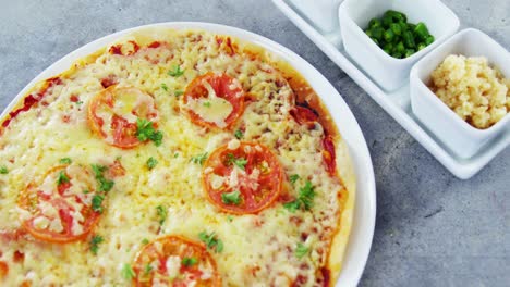 Baked-pizza-with-cherry-tomato-toppings-and-ingredients