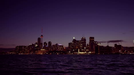 establishing shot of the toronto skyline at night.