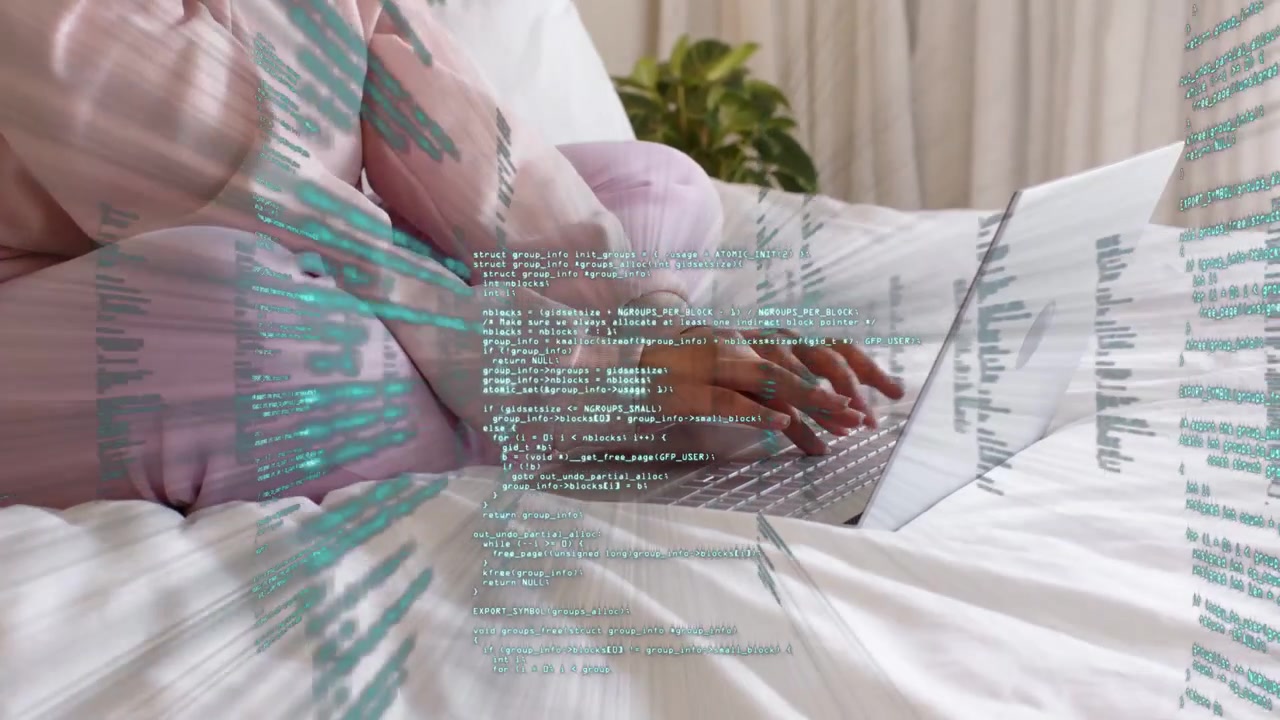 Woman coding on laptop, causing green code overlay to intensify, forming tunnel then scattering