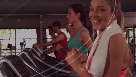 exercising on treadmills, people with abstract light animation overlay in gym