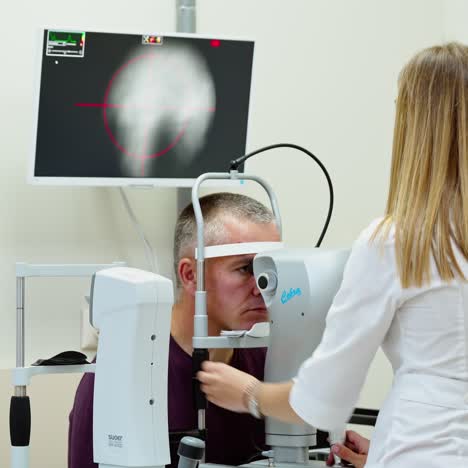 ophthalmologist checks the eyes