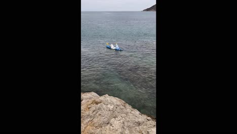 kayaking on the ocean coastline