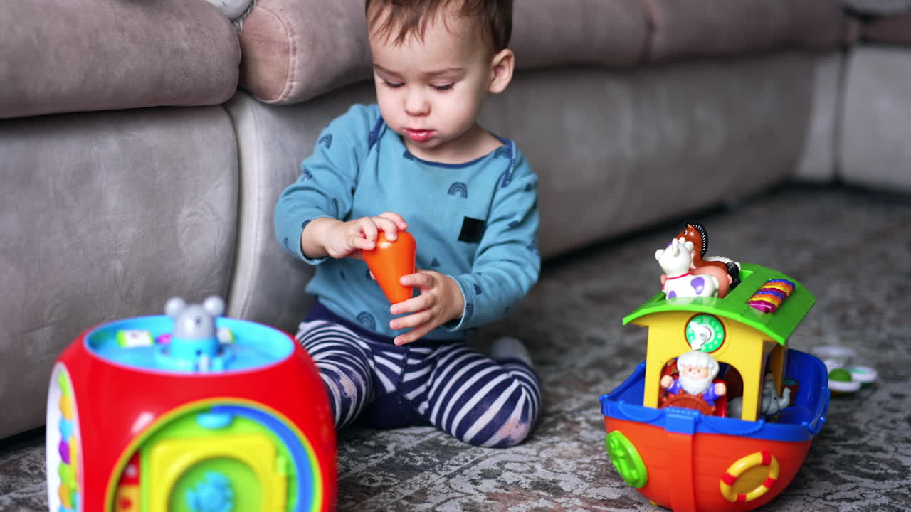 Toddler playing with toys