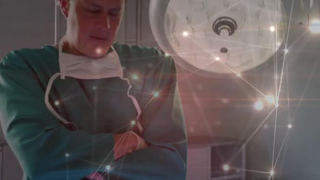 animación de la red de conexiones a través de cirujano caucásico masculino comprobando equipo médico