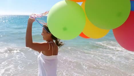 Woman-running-with-the-balloons