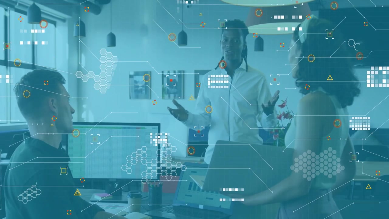 Presenter unfolding hands after holographic data overlays fading in, guiding business team meeting