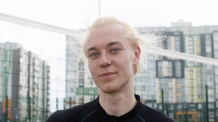 Close-up view of volleyball player outdoors