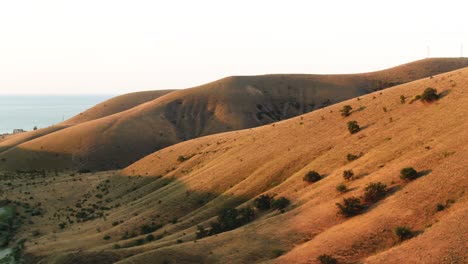 sunrise or sunset over dry hills