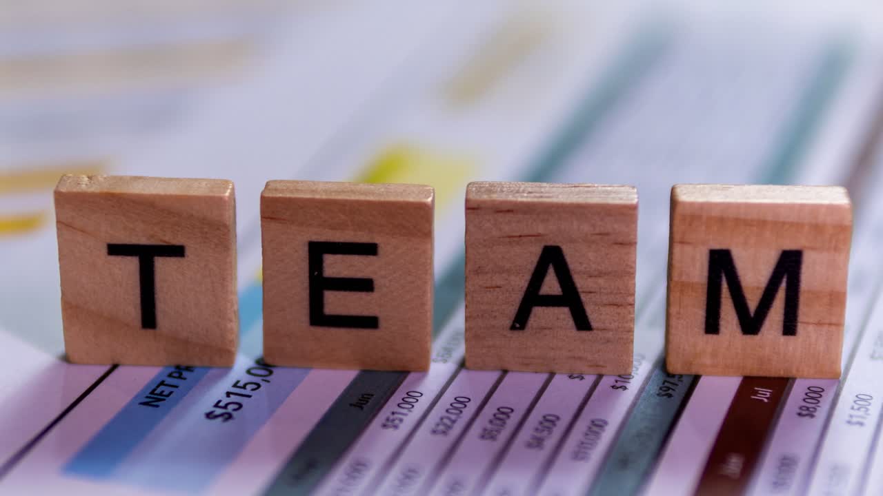 Explore effective team collaboration strategies in a business setting through graphic design insights.