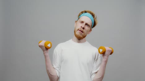 tired man with dumbbells